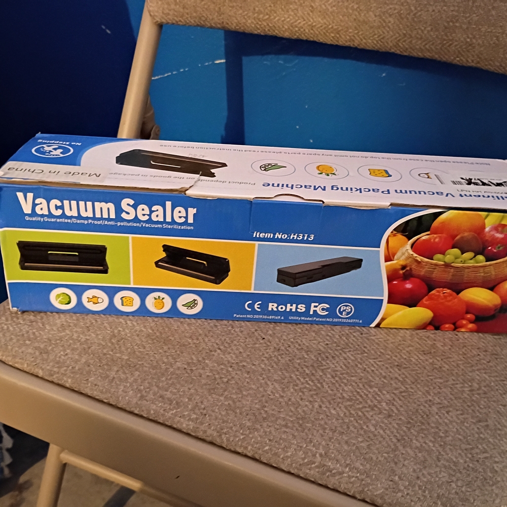 Vacuum Sealer with Blue Packaging